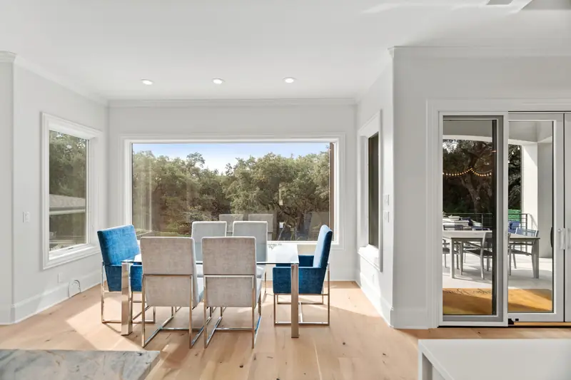 Breakfast room with a picture window and a sliding door to the patio