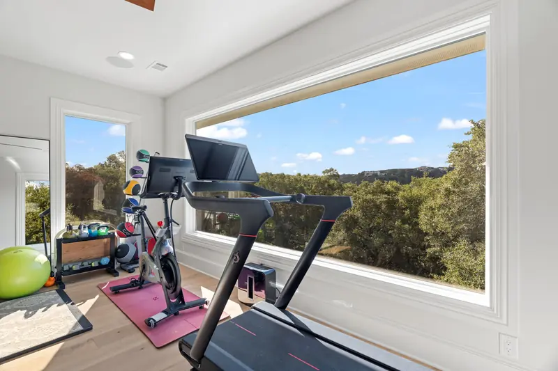 Large picture window running the length of a home gym